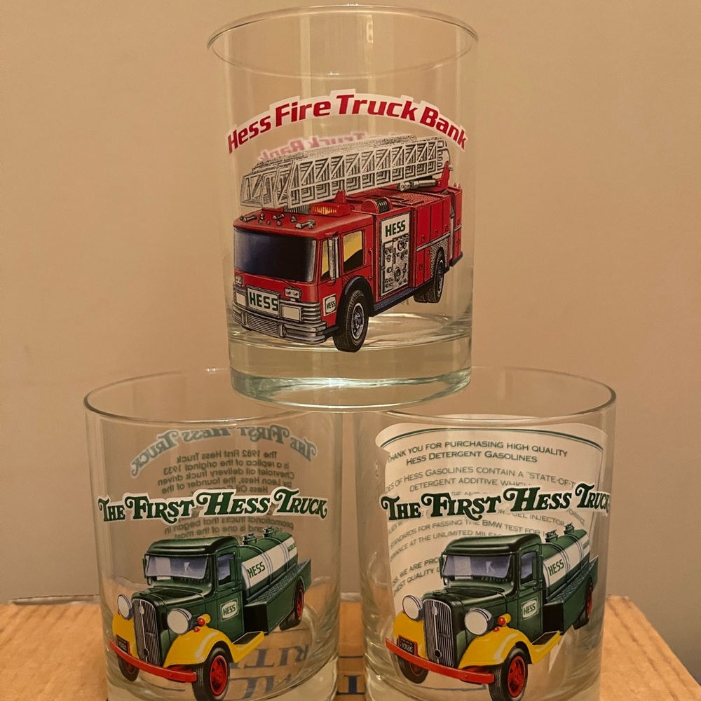 Hess truck series 1996 drinking glasses 
2 Hess oil company and 1 fire truck.